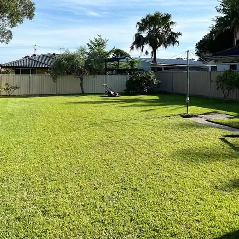 Lawn mowing & edging by Sunny Garden in Long Jetty